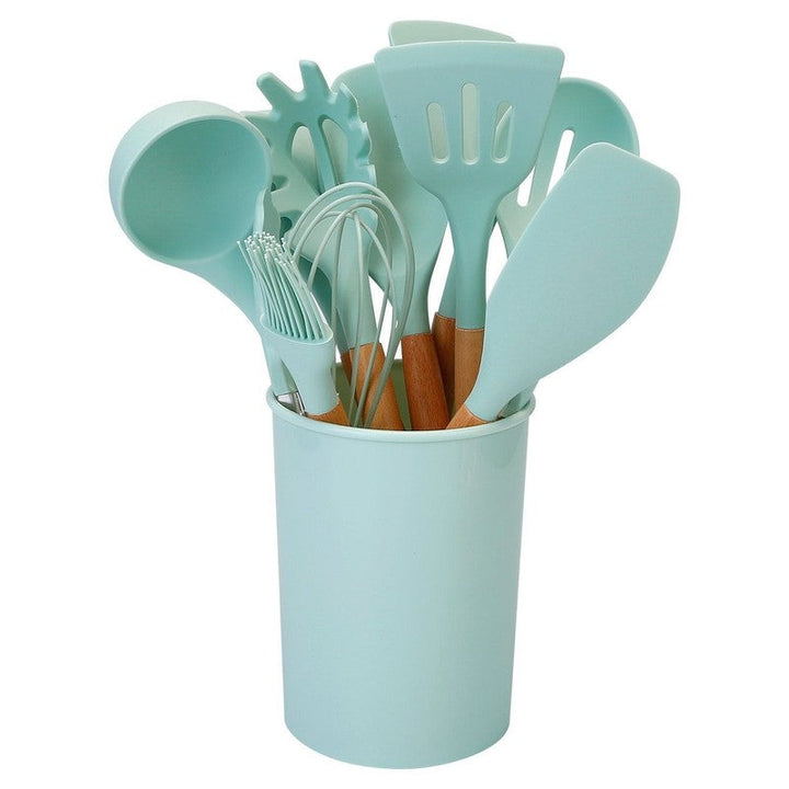 Set completo de utensilios de cocina de silicona y madera para una organización óptima.