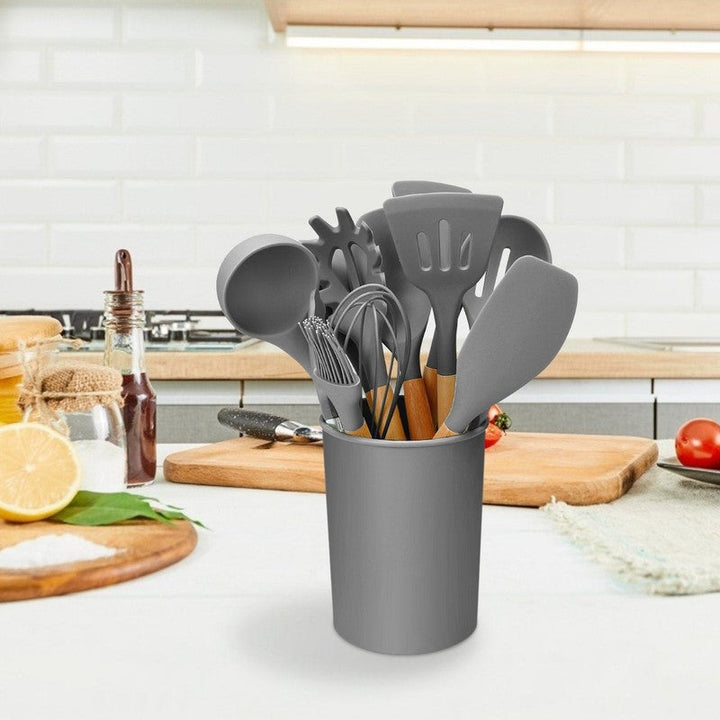 Cuchara de silicona y madera del set de utensilios de cocina, libre de BPA.