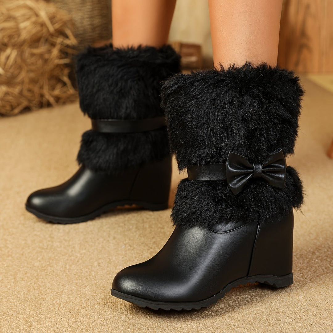 Vista frontal de botas plataforma mujer, diseño resistente. Calzado invernal ideal para un estilo casual-elegante.