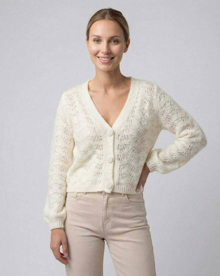Cárdigan Sienna blanco de mujer. Cuello en V, manga larga. Prenda versátil para superposición, oficina o look casual.