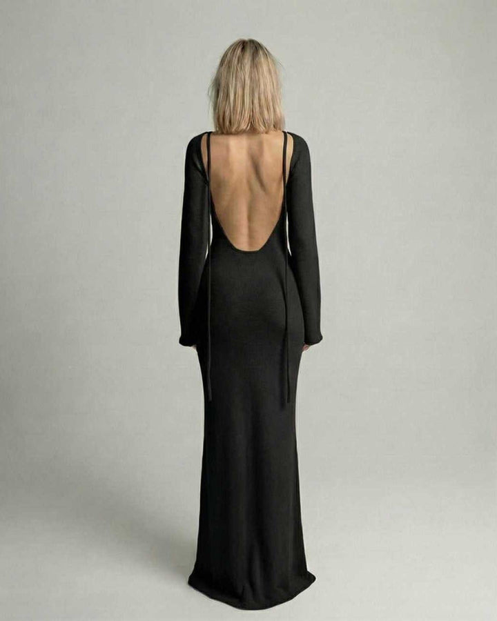 Vestido maxi negro de línea A para mujer, diseño sin espalda, perfecto para un look casual o elegante.
