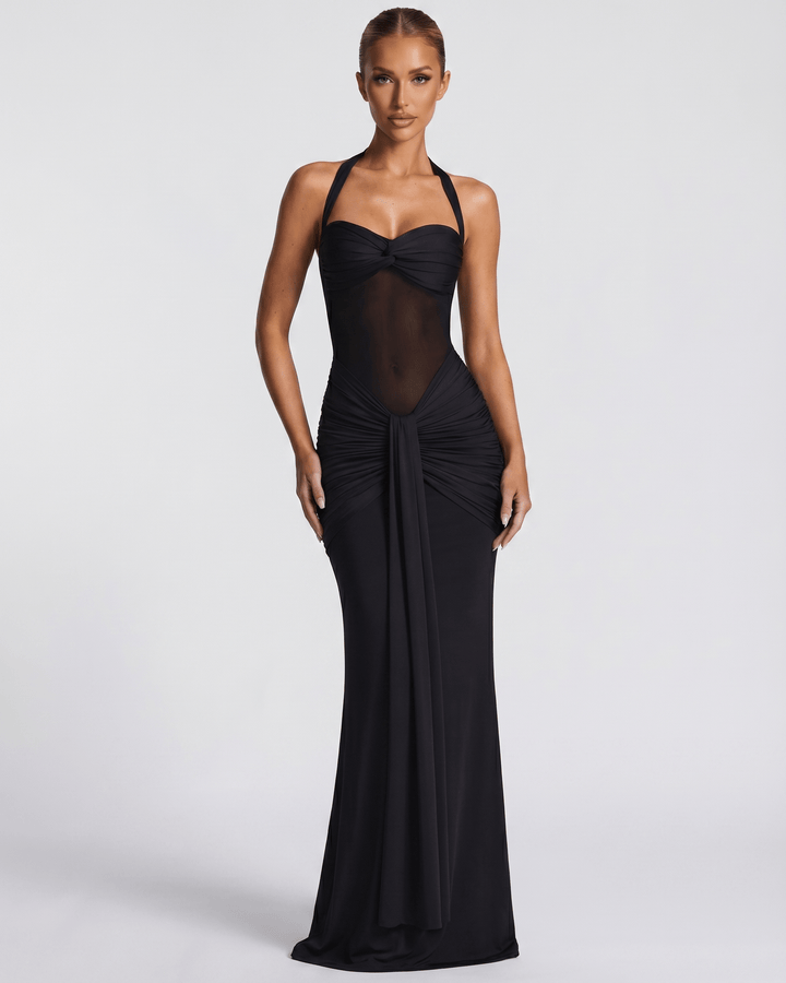 Vestido maxi blanco elegante para mujer con escote halter y detalles de malla, ideal para ocasiones especiales.