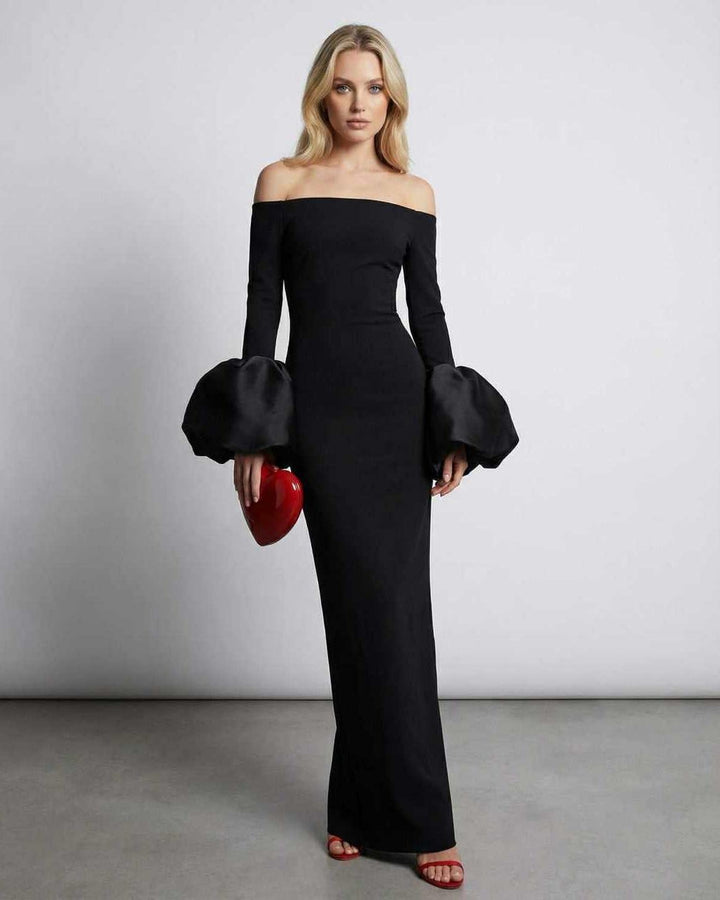 Vestido maxi negro Sienna elegante para mujer, con hombros descubiertos y mangas abullonadas. Ideal para fiestas.