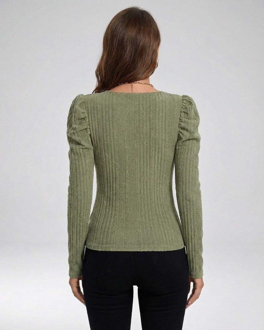 Suéter de punto acanalado moderno para mujer con mangas largas, perfecto para invierno.
