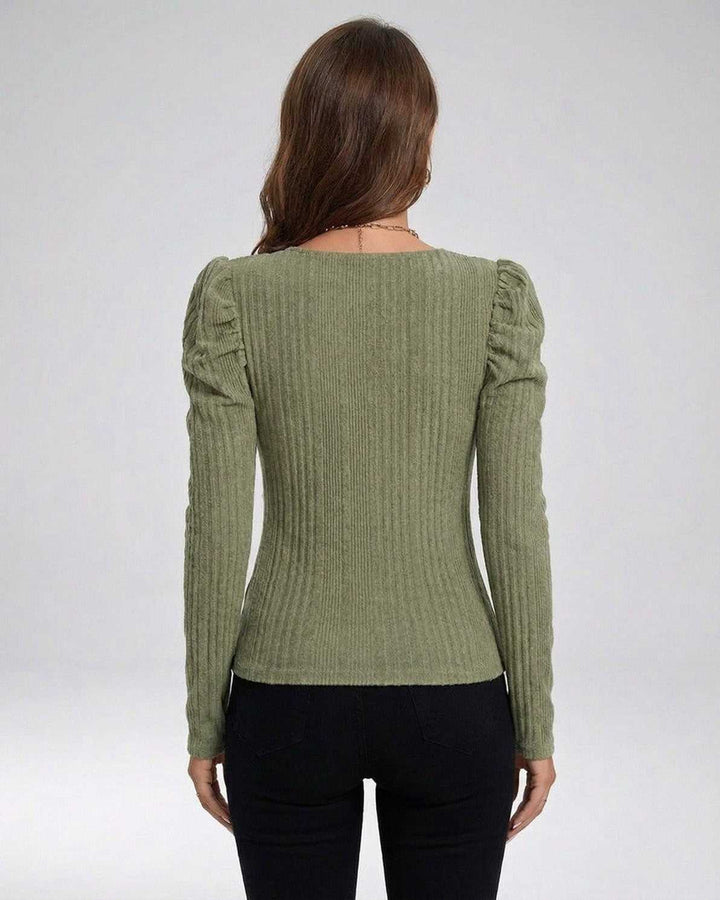 Suéter de punto acanalado moderno para mujer con mangas largas, perfecto para invierno.
