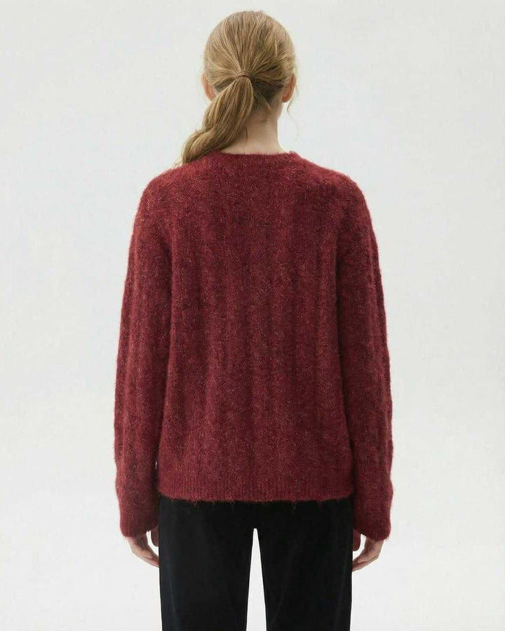 Pullover blanco Sienna para mujer, moderno y atemporal, perfecto para un look casual y cómodo.
