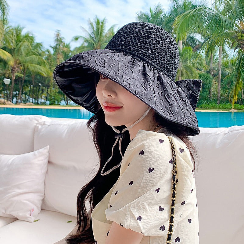 Sombrero de paja plegable para mujer, protección solar UPF 50+, ideal para playa y viaje.