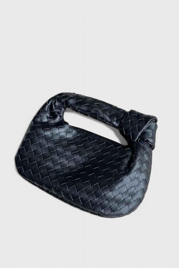 Bolso satchel mini de piel vegana tejida, un accesorio de moda compacto y chic para mujer.