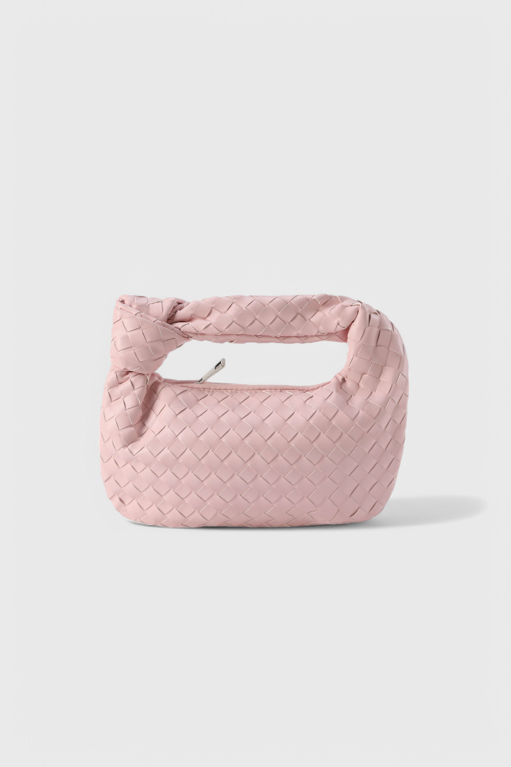 Lujoso mini bolso satchel de piel vegana tejida. Accesorio elegante y compacto para mujer, con estilo único.