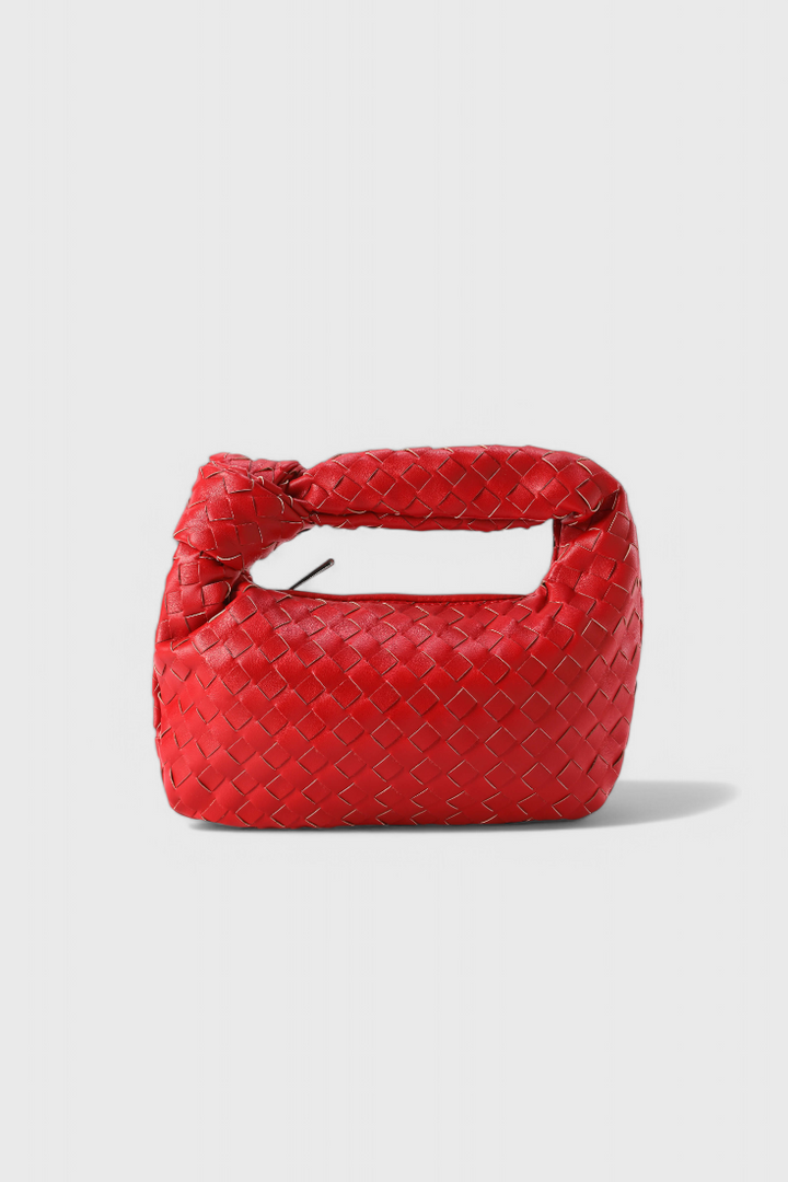 Mini bolso satchel elegante para mujer, piel vegana tejida. Accesorio de moda compacto y sofisticado.