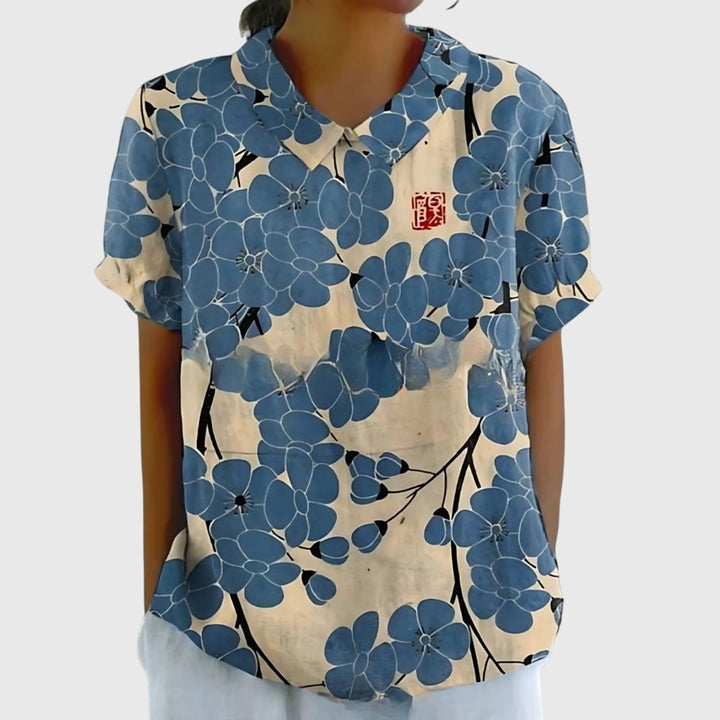Blusa de lino floral para mujer, fresca y elegante para cualquier ocasión estival.
