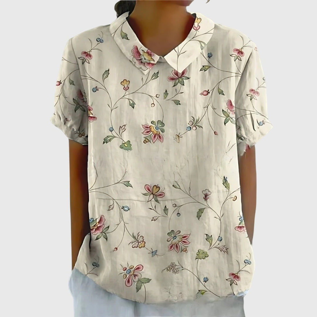Blusa de lino con estampado botánico para mujer, diseño floral vibrante y fresco ideal.