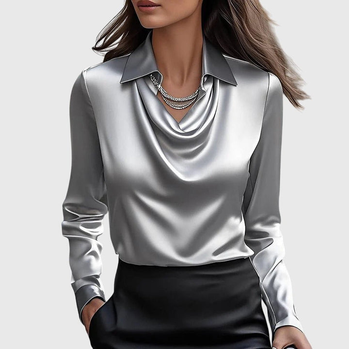 Blusa sofisticada y versátil para mujer. Ideal para moda casual o un look elegante.