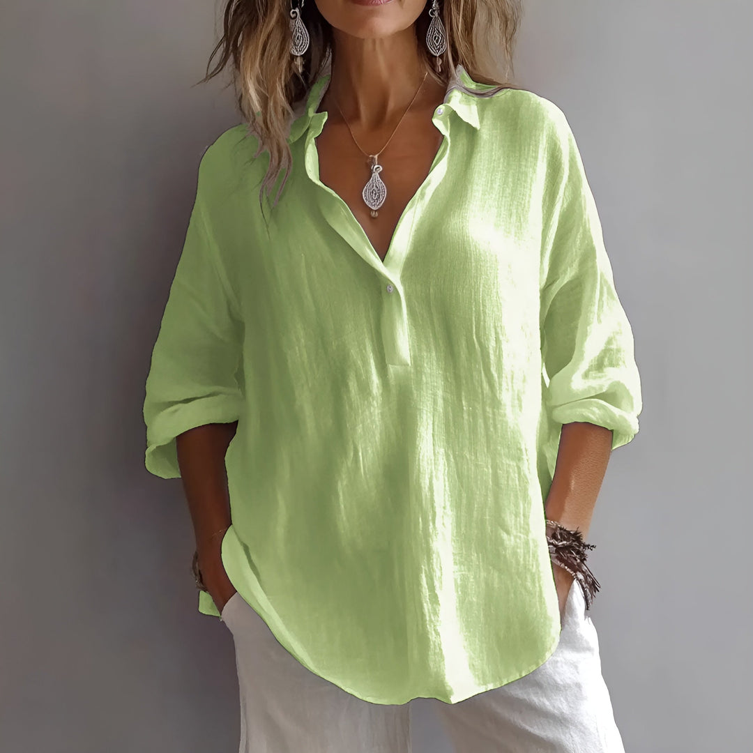 Blusa femenina elegante con cuello V y mangas ajustables. Perfecta para un estilo chic, cómoda y fresca para mujer.