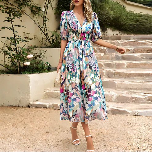 Moda mujer: Vestido midi de verano, fluido y chic, con manga abullonada y escote en V.