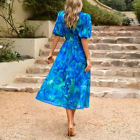 Ropa femenina: Vestido midi fluido con manga abullonada y escote en V, estilo chic y moderno.