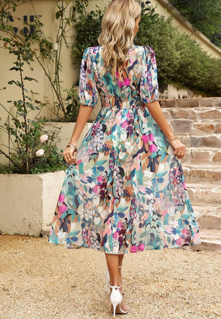 Vestido midi rosa con mangas abullonadas, estilo elegante y casual. Perfecto para mujer en verano.