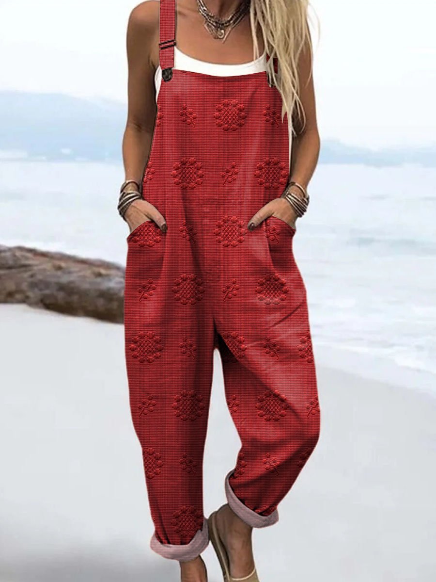 Mono femenino con bolsillos y pierna ancha, diseño ajustable, perfecto para un look cómodo y veraniego.