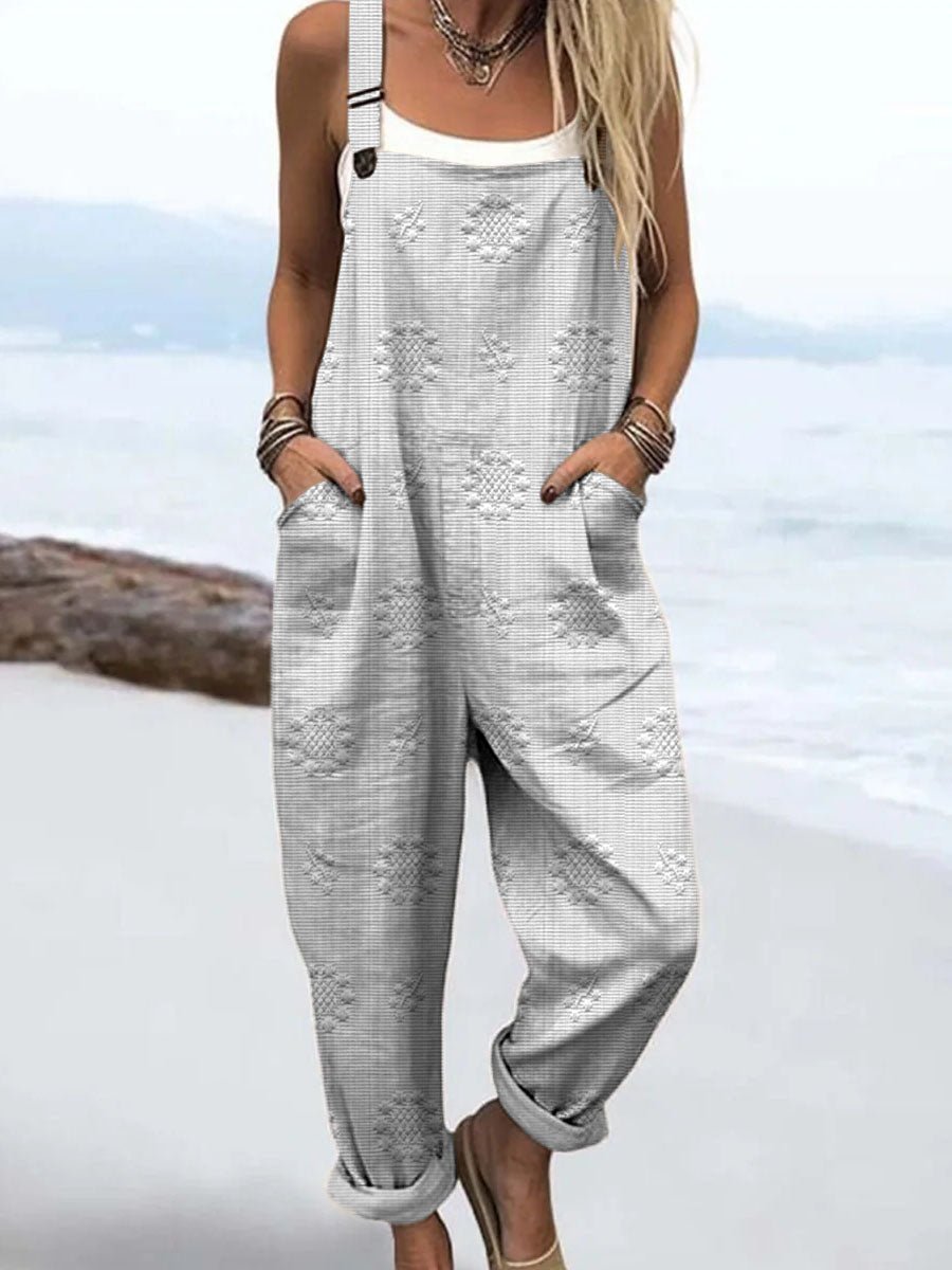 Atractivo mono de mujer, ajustable y cómodo, con pierna ancha y bolsillos, ideal para un estilo relajado.