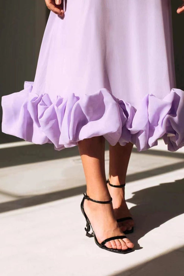 Vestido de fiesta largo para mujer con volantes, un look chic para cualquier boda o evento elegante.