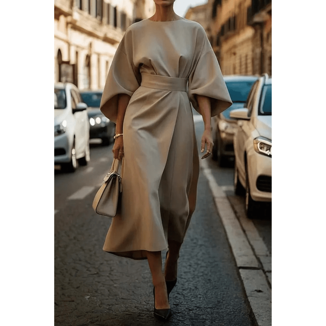 Vestido midi chic Sofía para mujer, con mangas esculturales que aportan un toque moderno y elegante a la prenda.