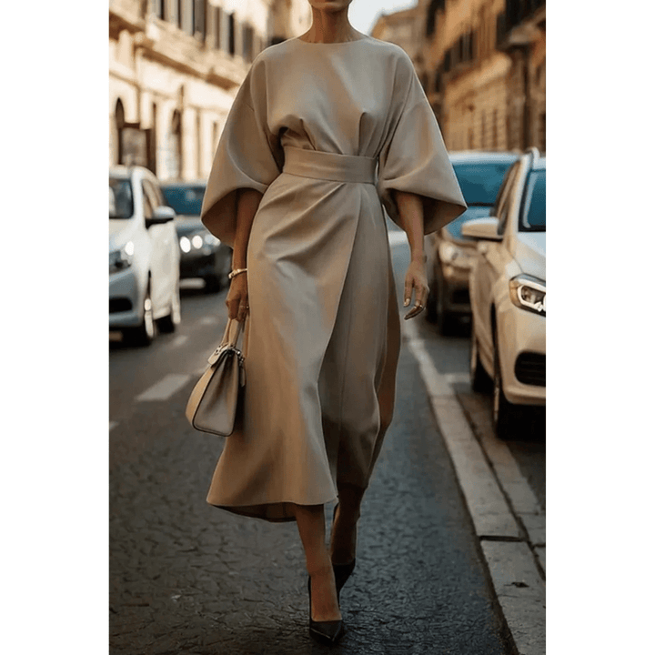 Vestido midi chic Sofía para mujer, con mangas esculturales que aportan un toque moderno y elegante a la prenda.