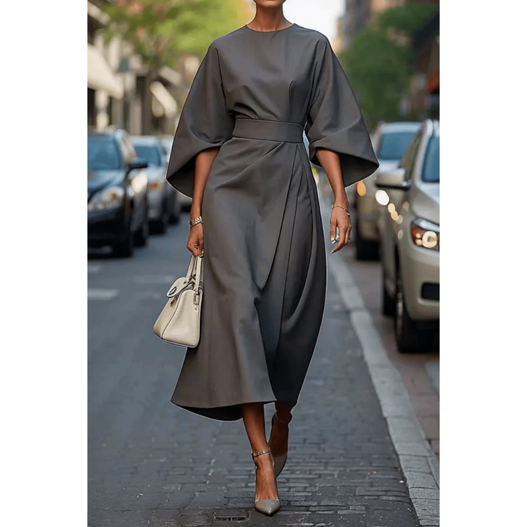 Vestido midi elegante para mujer, con mangas esculturales de estilo moderno. Perfecto para cualquier ocasión especial.