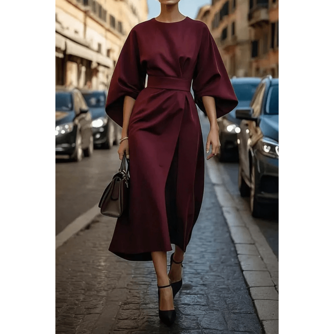 Vestido midi elegante con cintura ajustable y mangas esculturales, para mujer. Estilo moderno y sofisticado.