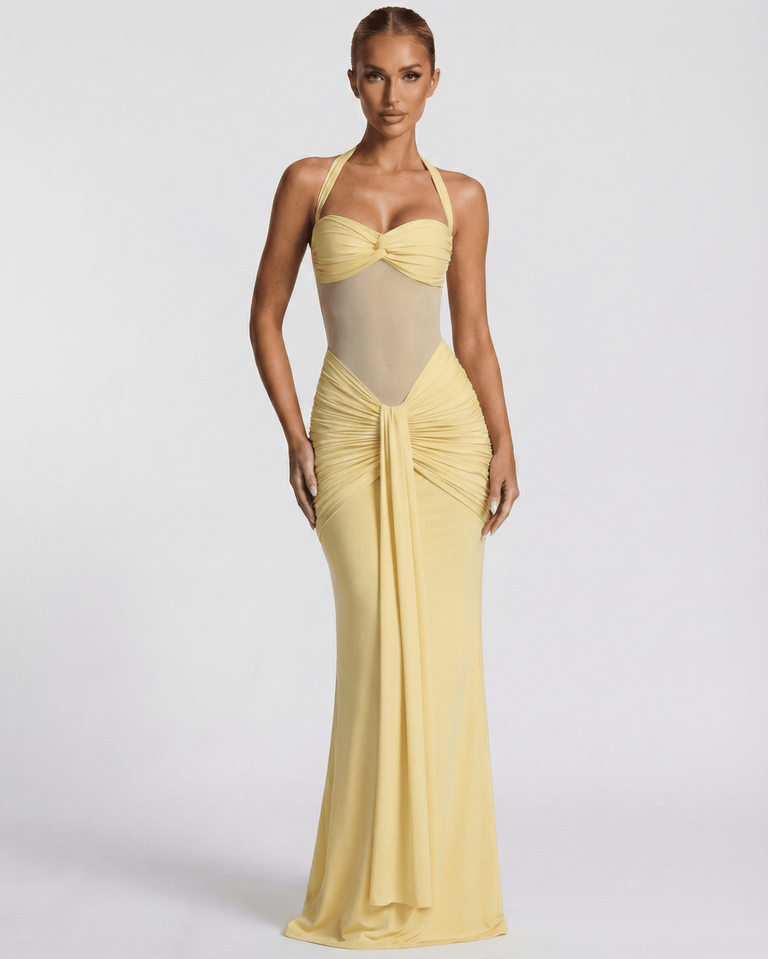 Vestido maxi halter blanco para mujer con silueta sirena elegante. Ideal para fiestas y ocasiones formales.