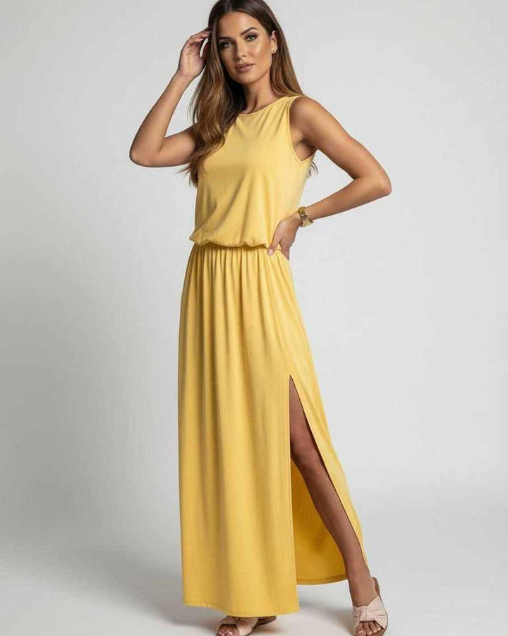 Vestido largo amarillo casual y cómodo, perfecto para verano. Diseño sin mangas y fluido, ideal para look veraniego.