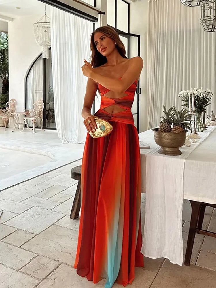 Mujer luciendo vestido largo Solaria con espalda descubierta, elegante y perfecto para ocasiones especiales de verano.