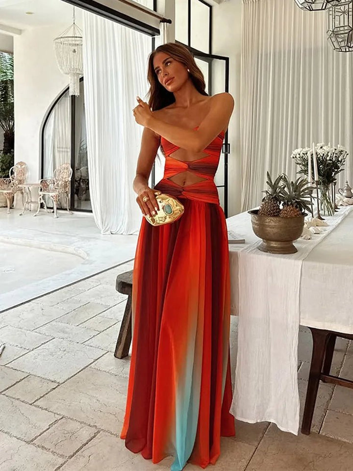 Mujer luciendo vestido largo Solaria con espalda descubierta, elegante y perfecto para ocasiones especiales de verano.