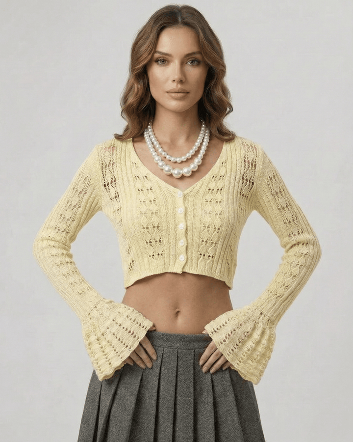 Cardigan corto amarillo para mujer, estilo moderno y versátil. Ideal para primavera y otoño.