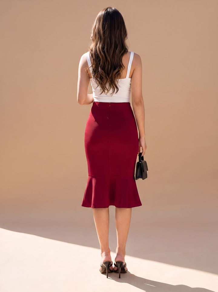 Falda midi fishtail de mujer, corte tubo y talle alto, ideal para un look de oficina profesional.