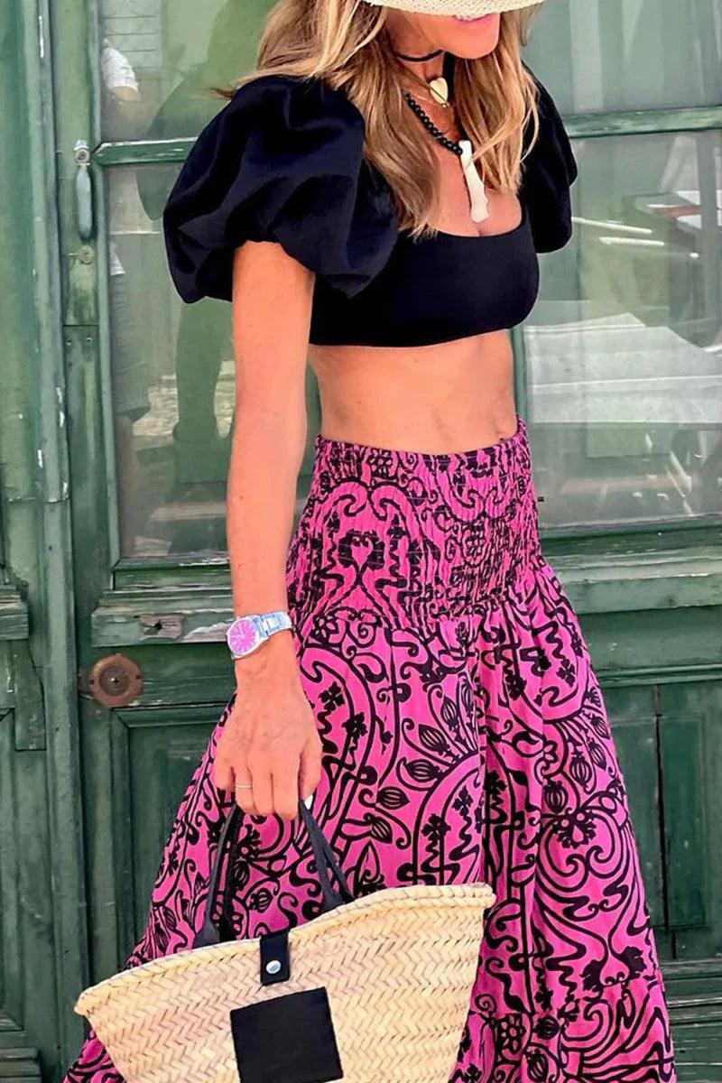 Maxi falda acampanada de cintura alta para mujer, look elegante y fluido. Perfecta para moda femenina.