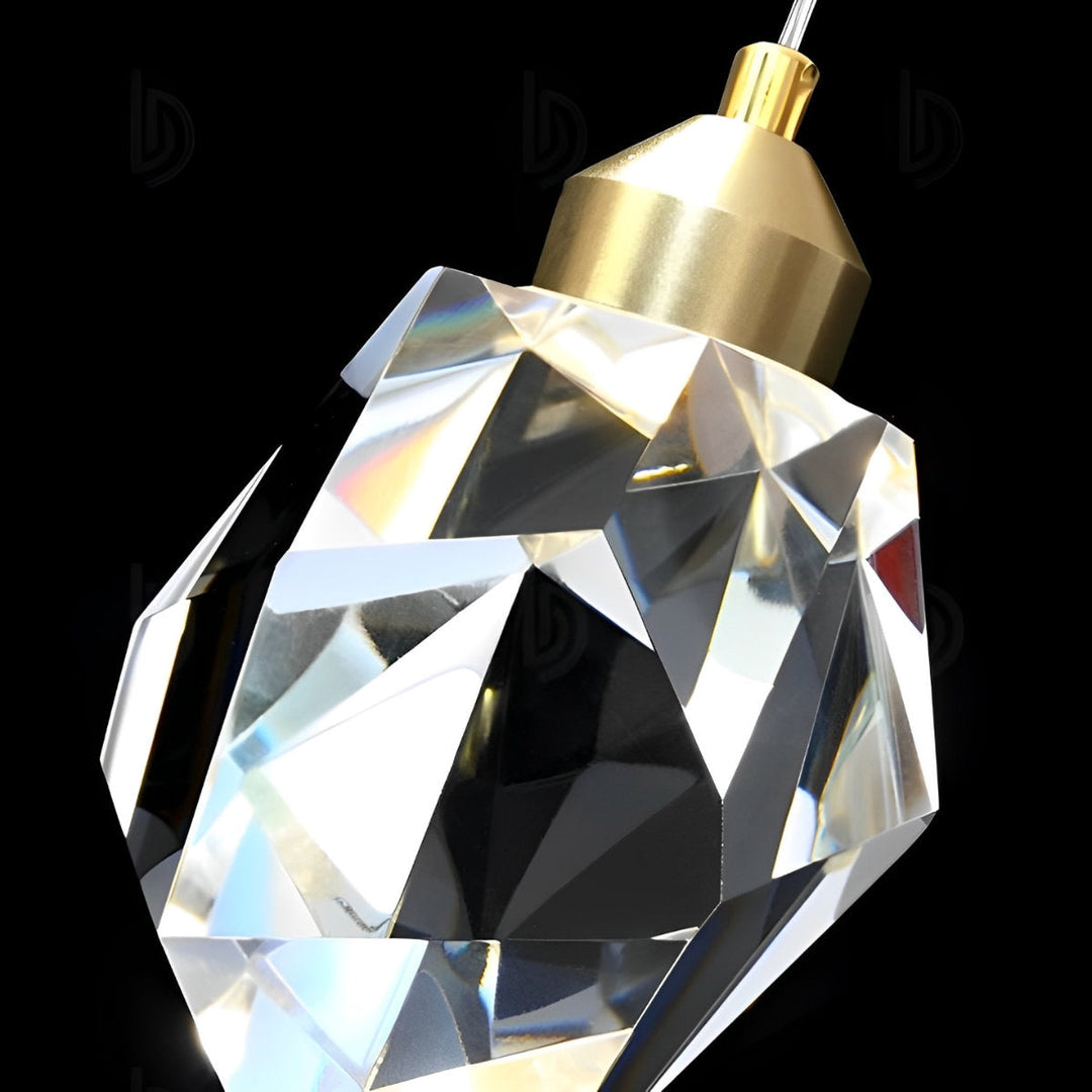 Lámpara colgante Astrae, cristal dorado, estilo espiral. Lujo y modernidad.