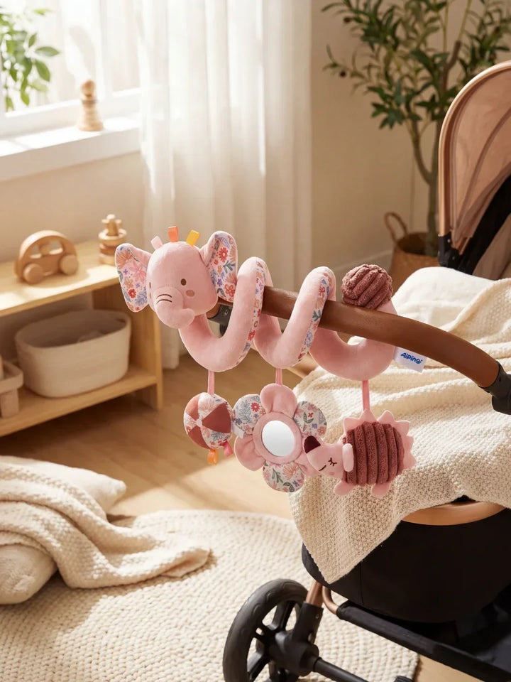 Juguete colgante espiral para cuna, fomenta la exploración sensorial y motora en bebés pequeños.