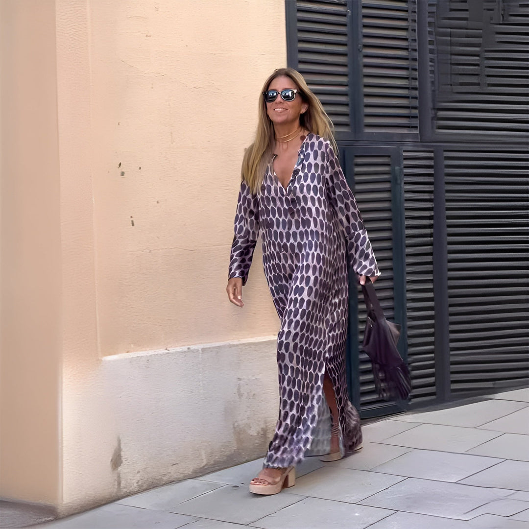 Vestido largo bohemio estampado Elaria para mujer con mangas largas. Ideal para verano, playa y vacaciones.