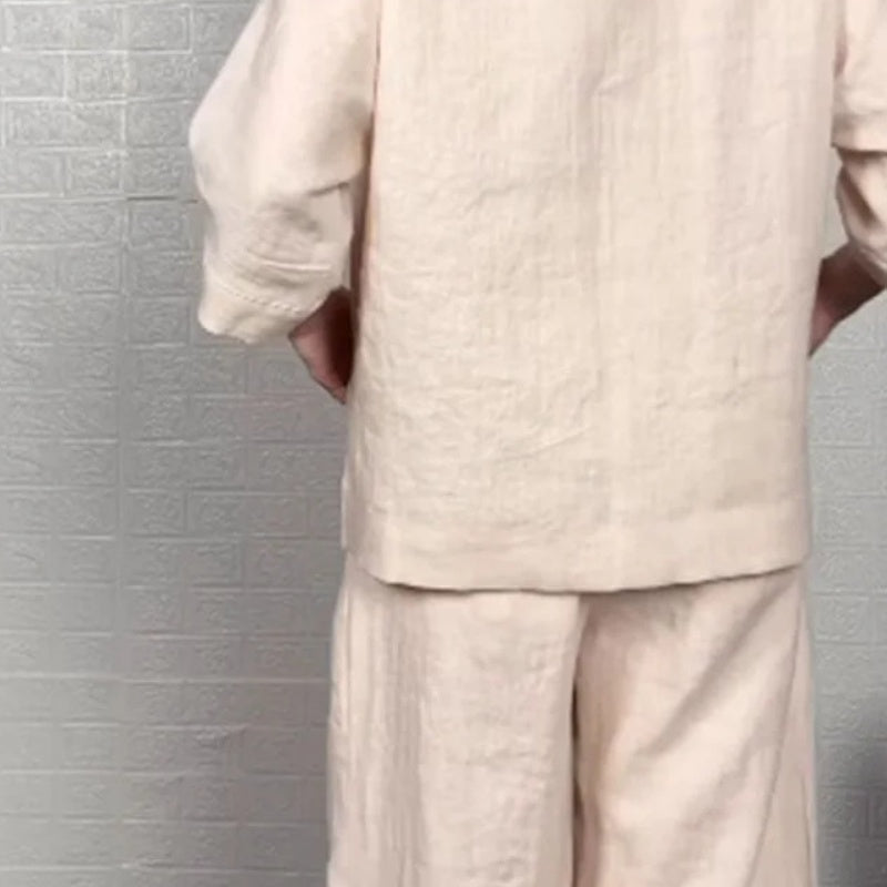 Silueta cómoda y chic: Conjunto de dos piezas para mujer con blusa de escote V y pantalón ancho, moda de verano.