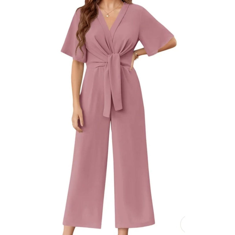 Mono de fiesta para mujer, corte de pierna ancha y escote envolvente. Estilo sofisticado y moderno.