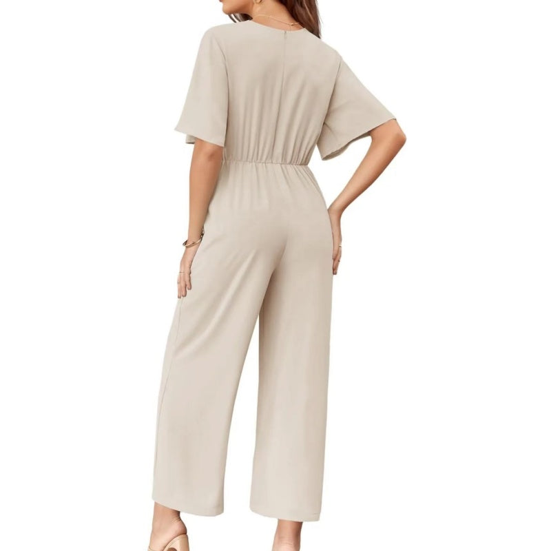 Mono mujer, diseño sofisticado con escote cruzado y pantalón ancho. Perfecto para ocasiones especiales.