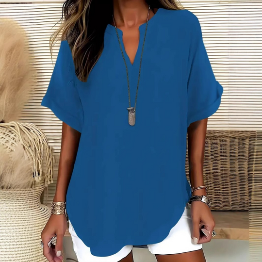 Blusa de mujer casual con escote en V y tejido transpirable. Top de mangas cortas ideal para moda de verano relajada.