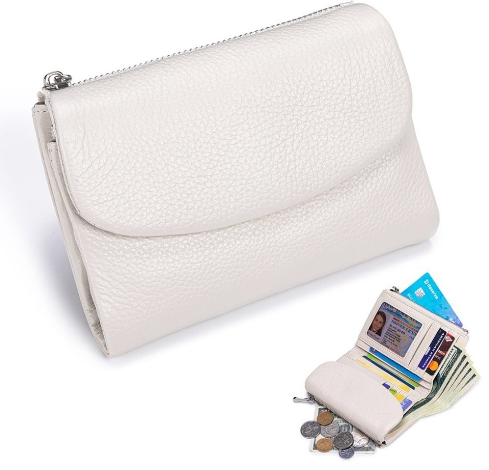Detalle de piel genuina: Cartera compacta con textura suave, RFID y doble monedero. Calidad superior.