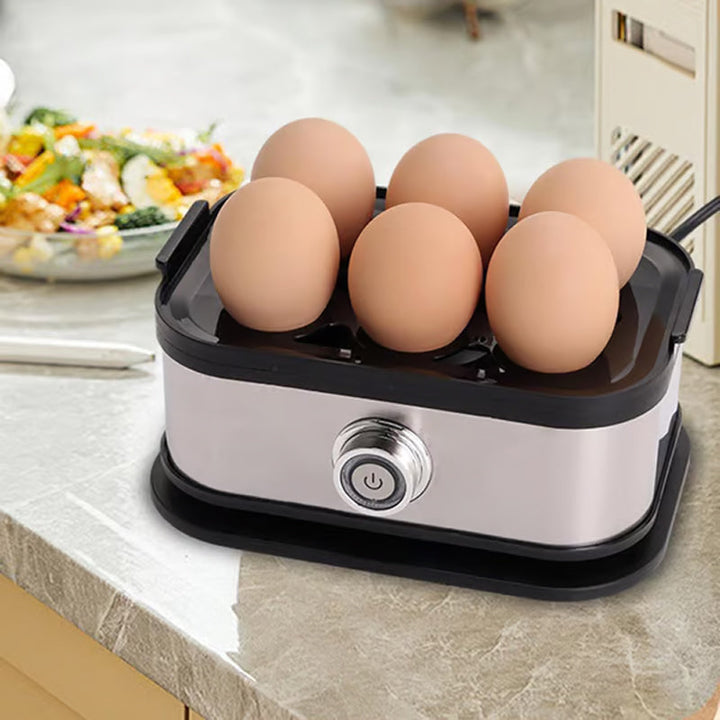 Preparador de huevos eléctrico con diseño compacto para cocinar huevos cocidos sin esfuerzo.
