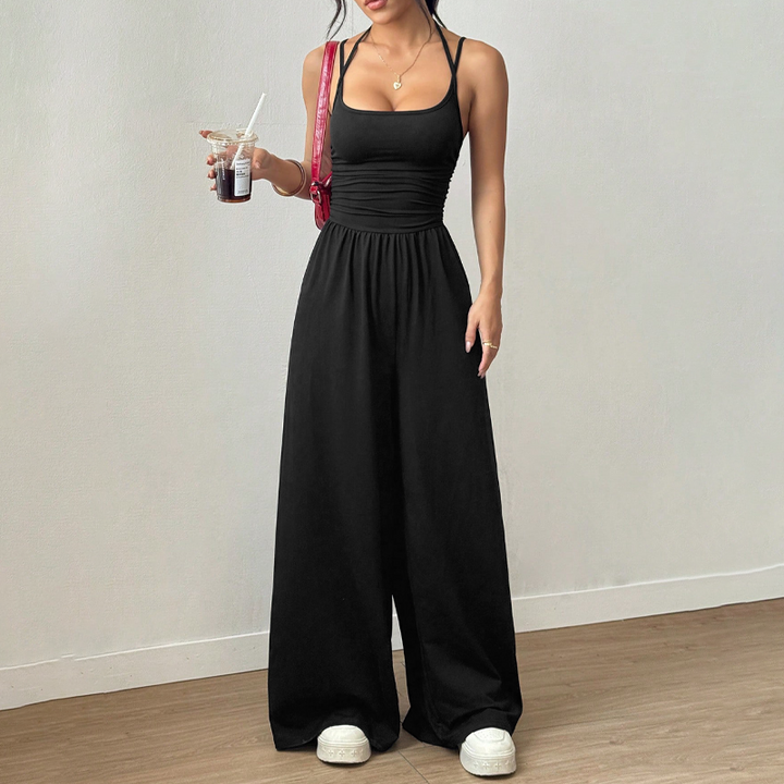 Mono elegante de verano para mujer, piernas anchas y tirantes finos, ideal para un look casual o formal.