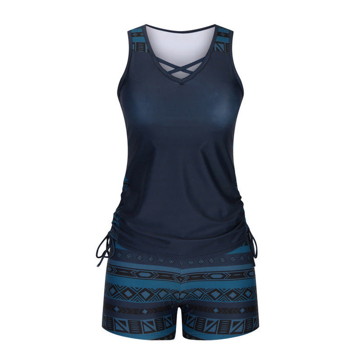 Tankini de dos piezas para mujer, escote V y estampado geométrico en tonos azules y blancos.