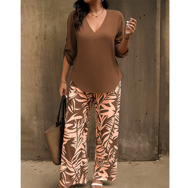 Conjunto casual y elegante de blusa suelta cuello V y pantalón estampado, perfecto para cualquier ocasión.