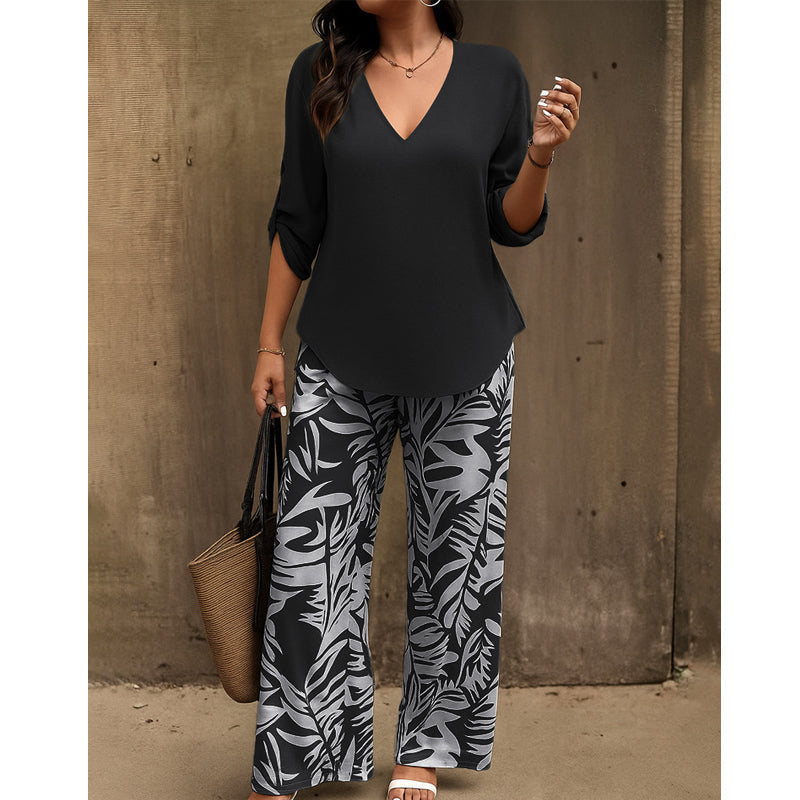 Conjunto de mujer con blusa cuello V y pantalón con estampado abstracto. Ropa cómoda y con estilo.