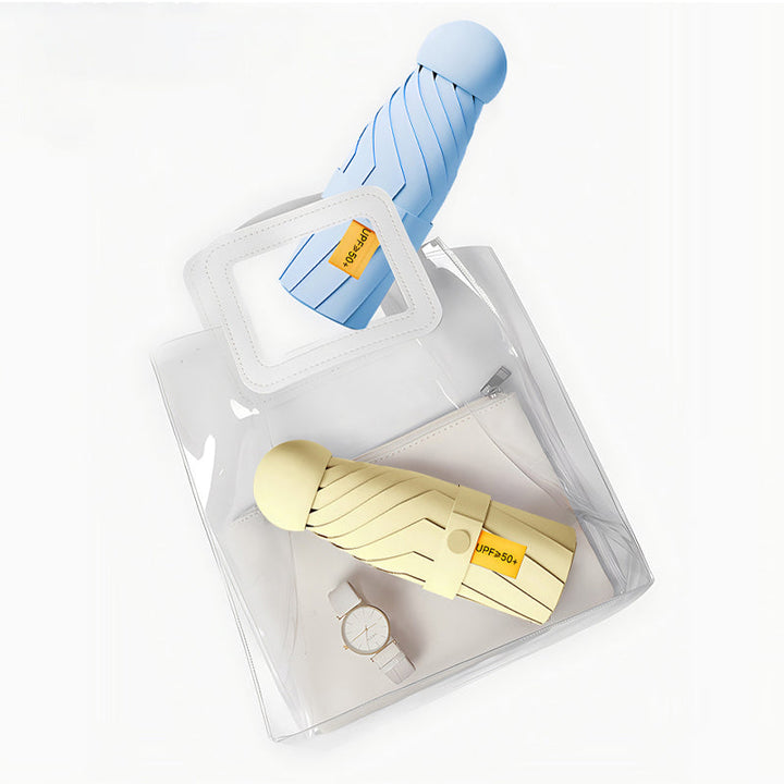 Paraguas de viaje plegable y resistente, ofrece protección solar UV UPF50+ y contra la lluvia impermeable.