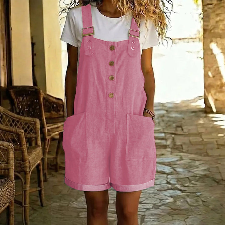 Peto corto de mujer estilo retro, con tirantes ajustables y prácticos bolsillos. Ideal para el verano.